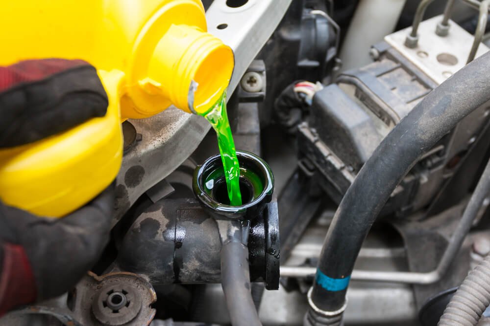 Should a Car Be Running When Adding Coolant